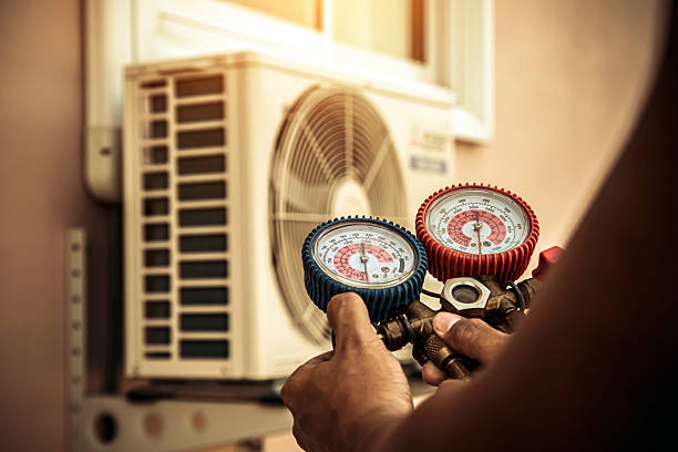 Professional Hvac technician working in Millville, UT